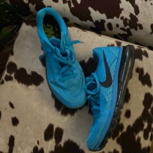 Blue Nike running shoes